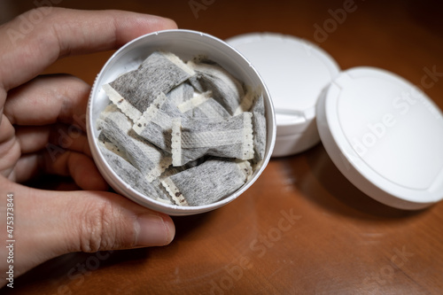 Fotografía Snus,  moist powder tobacco product widely consumed in Norway and Sweden and amo