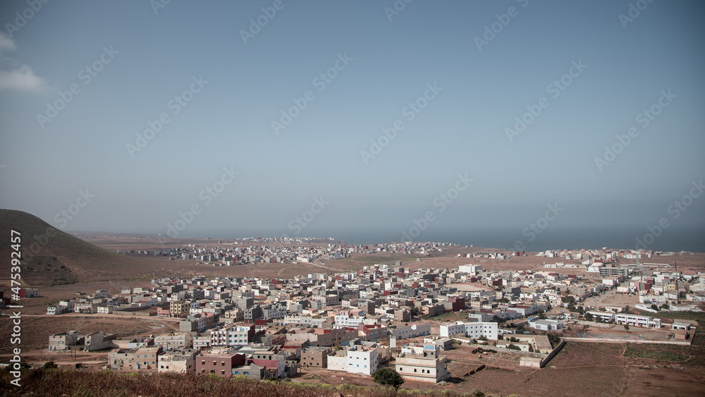 Landscape Village in the coast of Morocco Sand and sea with blue sky