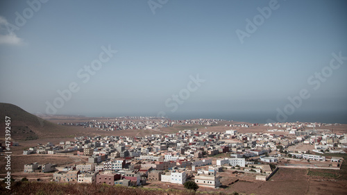 Landscape Village in the coast of Morocco Sand and sea with blue sky
