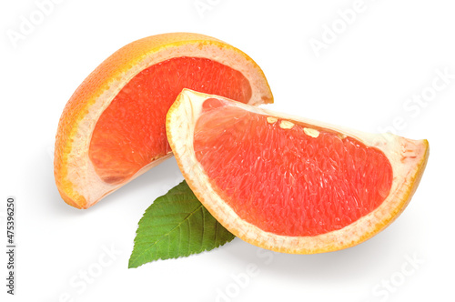 Slices of ripe grapefruit on a white background