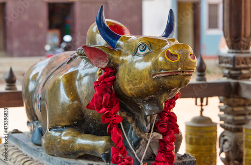 Cow sculpture at Hiranya Varna Mahavihar (Kwa Bahal), the Golden Temple, Kathmandu, Nepal photo