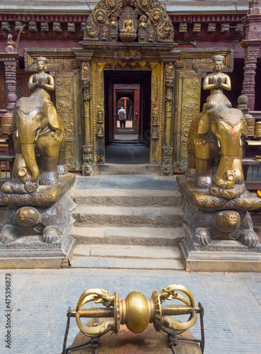 Statues at Hiranya Varna Mahavihar (Kwa Bahal), the Golden Temple, Kathmandu, Nepal photo