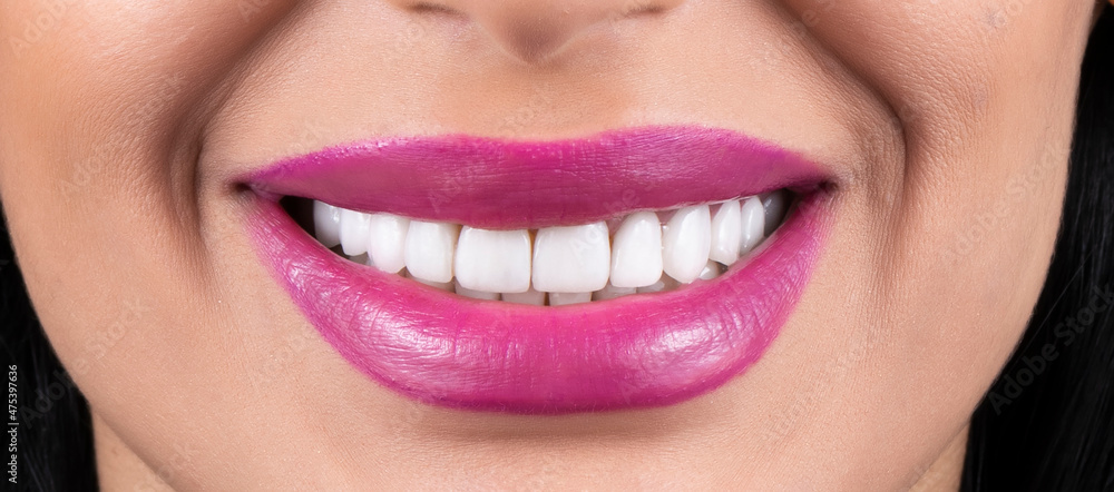 Fototapeta premium beautiful white smile with lipstics