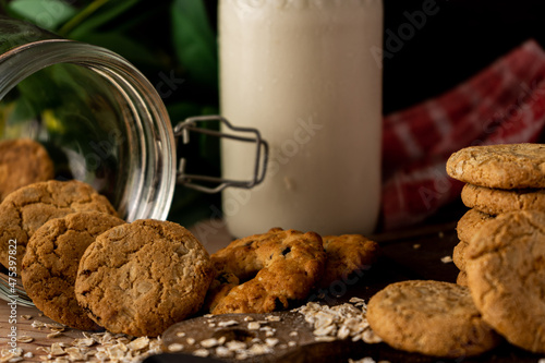 Fotografiet close-up of A Fallen Oatmeal Raisin Cookie Jar and a cookie tower on the side