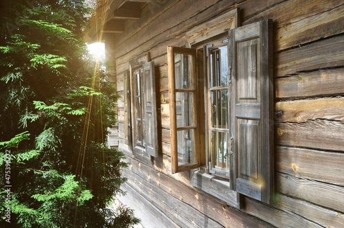 Old  wooden  windows  rural  house. Flare.