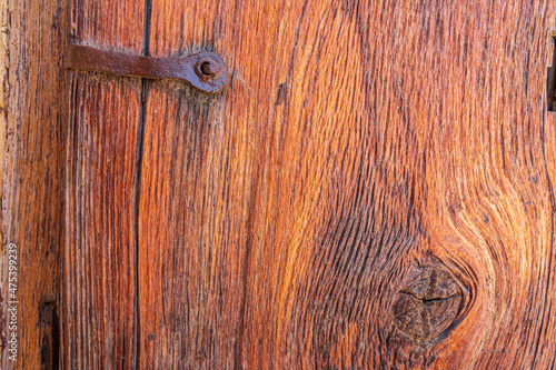 Middle East, Arabian Peninsula, Oman, Ad Dakhiliyah, Bahla. Ancient wooden door in Jabreen Castle.