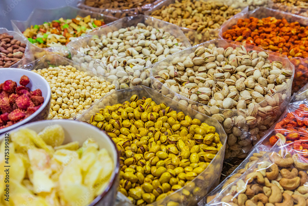Middle East, Arabian Peninsula, Oman, Ad Dakhiliyah, Nizwa. Pistachios and other nuts for sale in the souk in Nizwa, Oman.