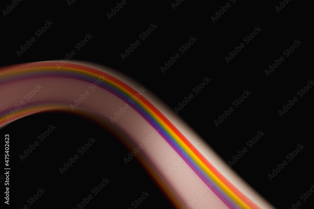 Colored lines of light on a black background. Colored lines of light on a black background.