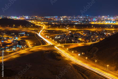 Middle East, Arabian Peninsula, Oman, Muscat, Bawshar. Night view of roads in Muscat. © Danita Delimont