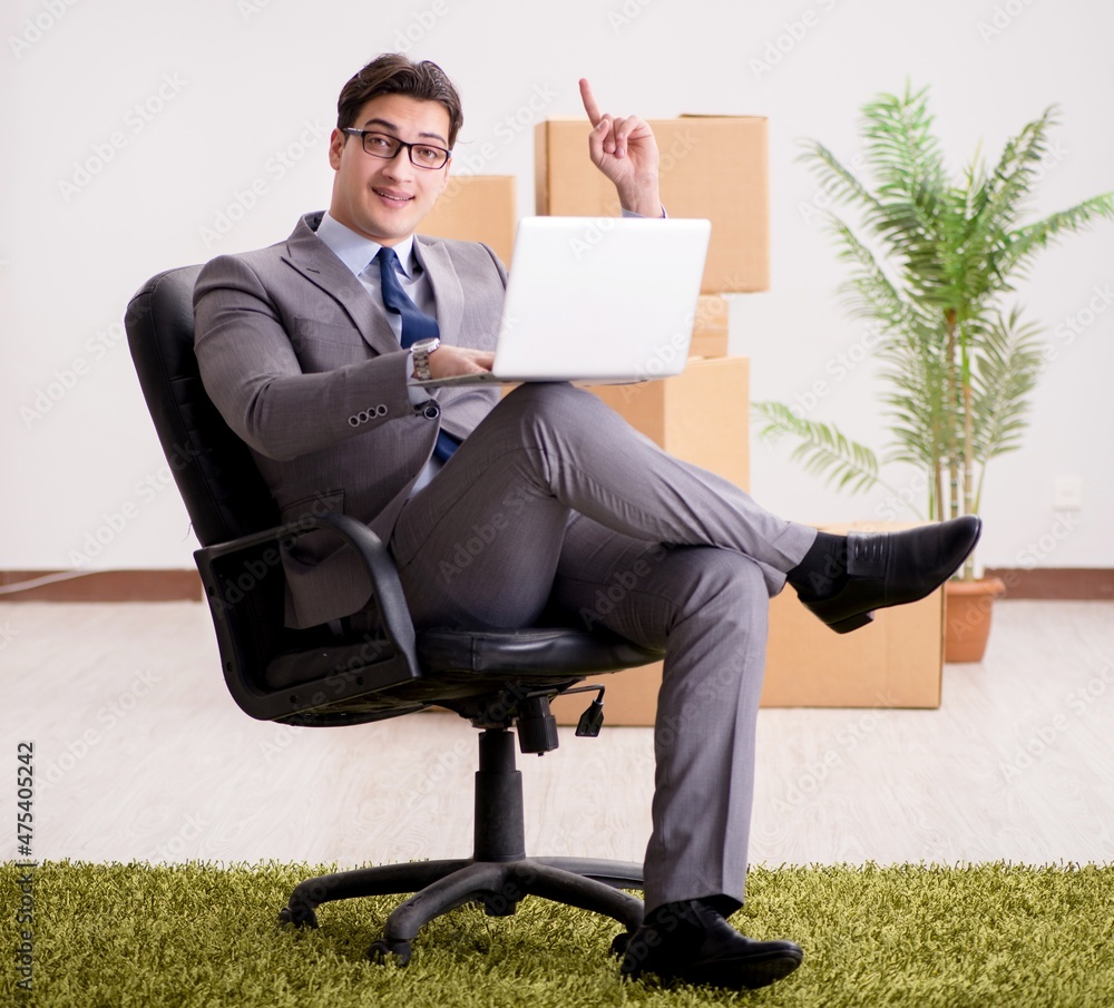 Businessman sitting on the chair in office Businessman sitting on the chair in office