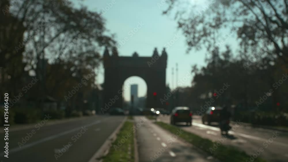 Blured defocused background city life view of Barcelona on sunny summer day, includin the typical buildings of spanish architecture, whith a slight camera movement Blured defocused background city life view of Barcelona on sunny summer day, includin the typical buildings of spanish architecture, whith a slight camera movement