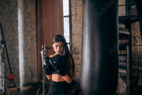 Young woman boxing workout at the gym © teksomolika