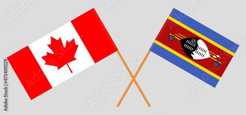 Crossed flags of Canada and Eswatini. Official colors. Correct proportion