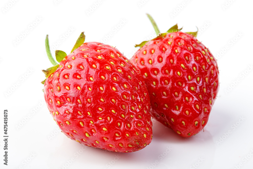 beautiful and ripe red strawberries on a white background beautiful and ripe red strawberries on a white background