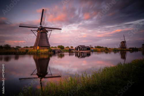 Europe, The Netherlands. Kinderdijk windmills at sunset. © Danita Delimont