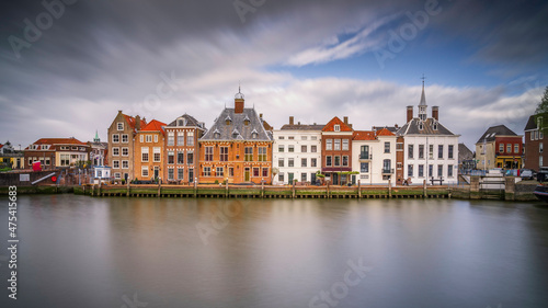 Europe, The Netherlands, Maassluis. Row of buildings on ocean pier.