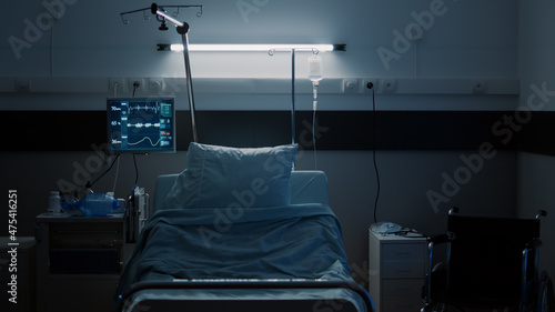 Obraz na plátně Nobody in hospital bed at clinical ward on modern floor with comfortable bed, monitor, medical equipment