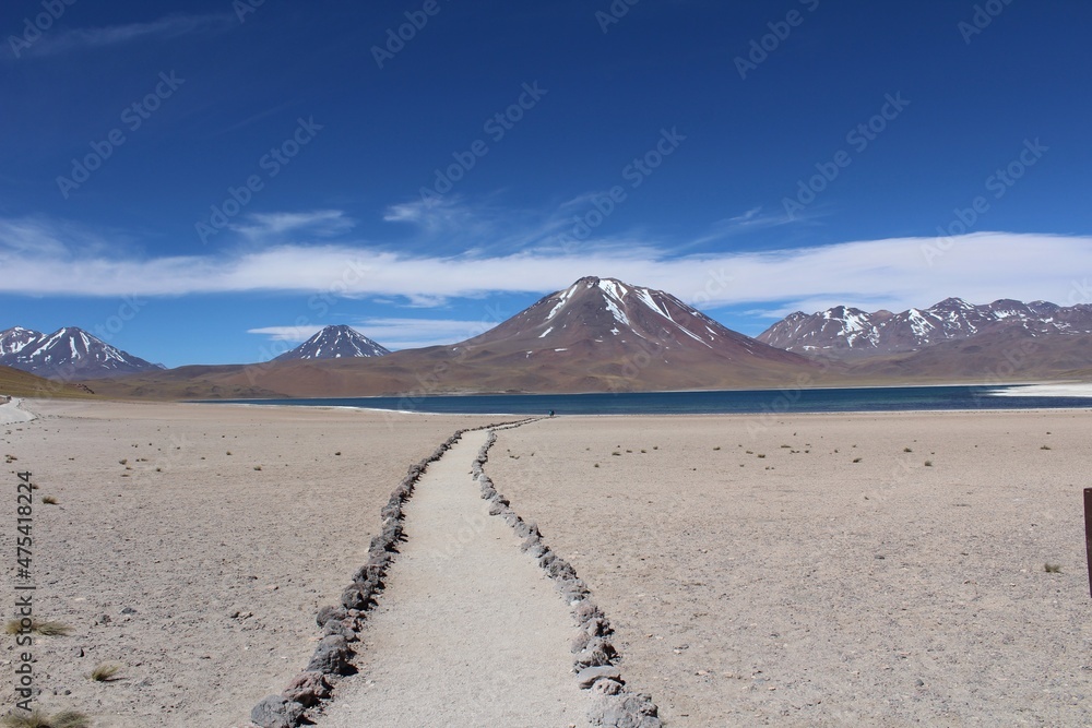 Path to Miscanti lagoon and volcanoes on the background, Chile.