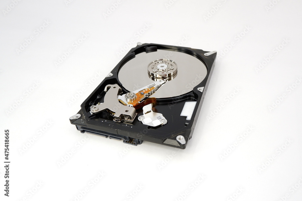 Hard drive HDD isolated on white background. The concept of data recovery, hard disk repair. Hard drive HDD isolated on white background. The concept of data recovery, hard disk repair.