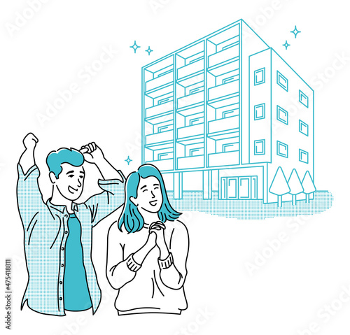 新築の集合住宅（アパート又はマンション）と喜ぶ夫婦