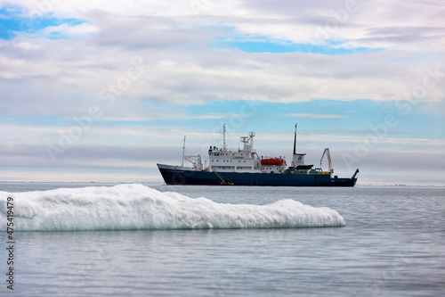 Cruise ship on ice, Cape Vankarem, Wrangel Island, Chukchi Sea, Russia Far East photo