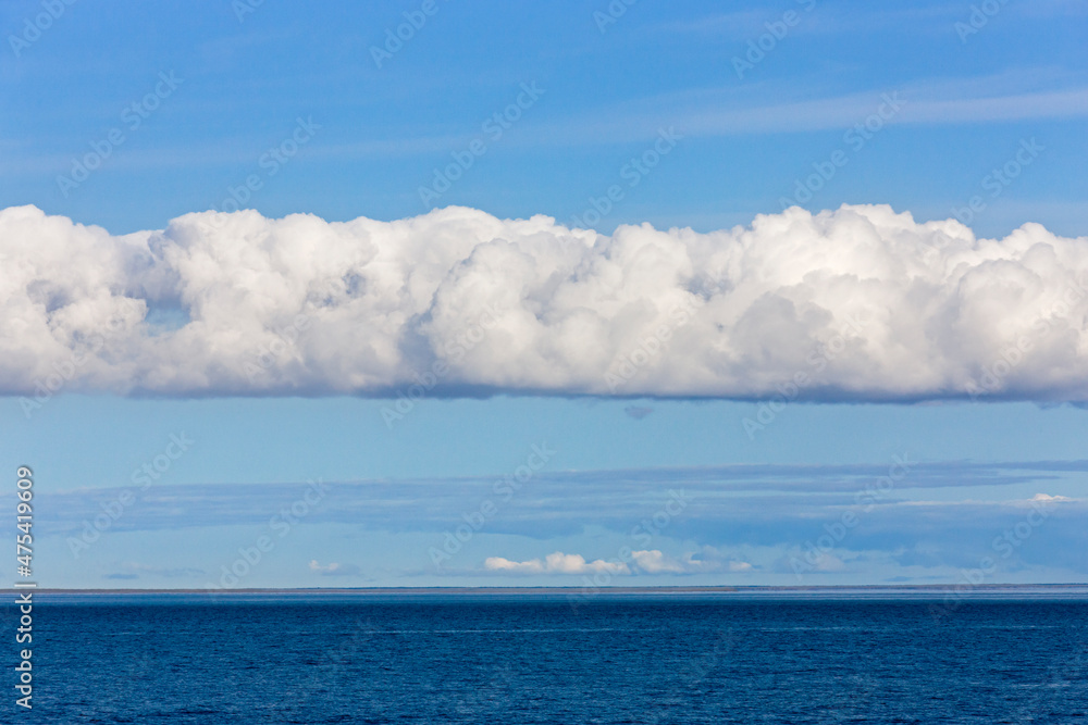 Clouds above the ocean, Cape Onman, Chukchi Sea, Russia Far East Clouds above the ocean, Cape Onman, Chukchi Sea, Russia Far East