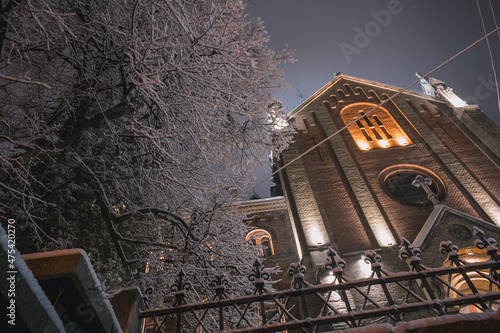 Lviv, Ukraine - december 2021: ST. IOANN ZOLOTOUSTYI CHURCH (FORMER FRANCISCAN ORDER CHURCH). Winter night time.