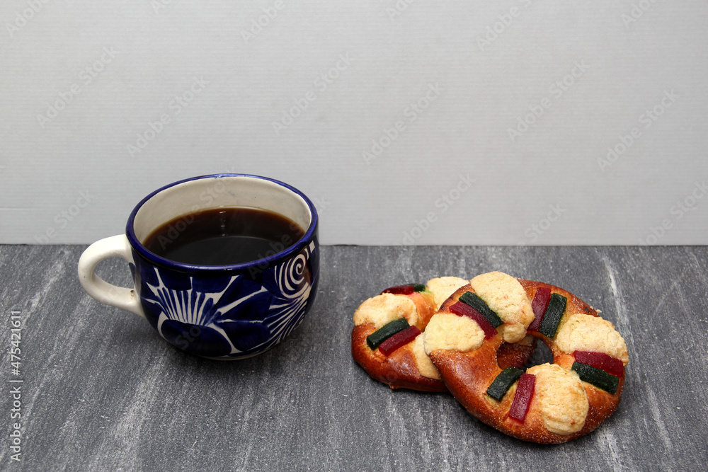 The roscón, rosca de Reyes or king cake is a sweet dough bun decorated with candied or crystallized fruit, with figurines inside for January 6, Three Kings Day.
The roscón, rosca de Reyes or king cake is a sweet dough bun decorated with candied or crystallized fruit, with figurines inside for January 6, Three Kings Day.
