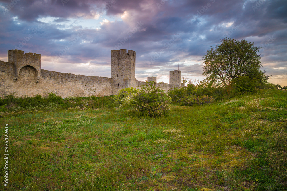 Sweden, Gotland Island, Visby, 12th century city wall, most complete medieval city wall in Europe, dusk