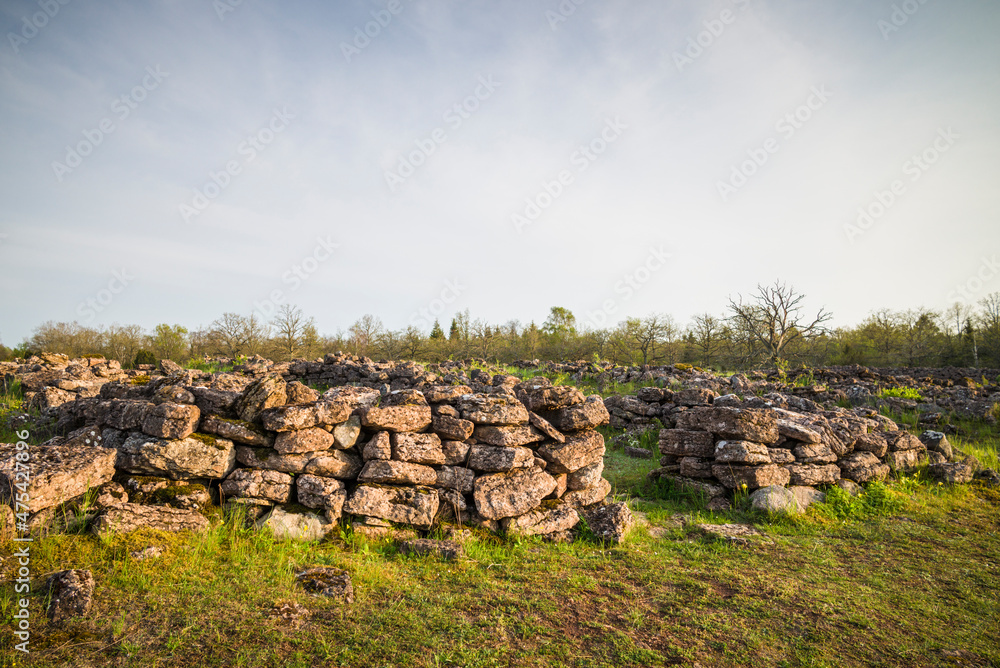 Sweden, Oland Island, Ismantorp, ruins of Ismantorp fortress, Bronze Age fortified town, sunset