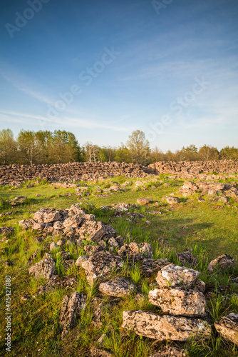 Sweden, Oland Island, Ismantorp, ruins of Ismantorp fortress, Bronze Age fortified town, sunset