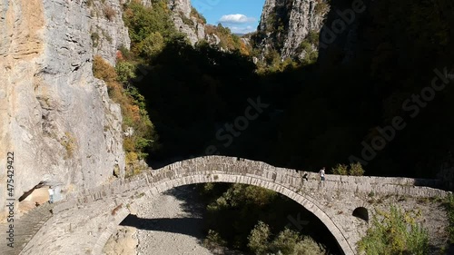 The beautiful old stone bridge known as Kokkoris or Noutsios bridge, near Ioannina town, Epirus Greece. photo