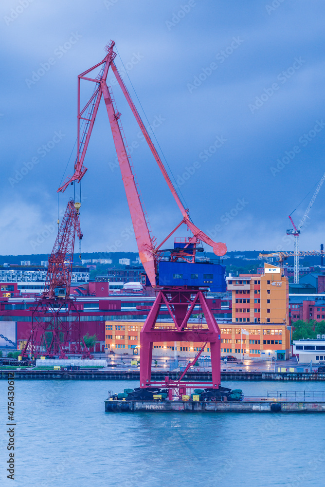 Sweden, Vastragotland and Bohuslan, Gothenburg, harbor crane, high angle view, dusk