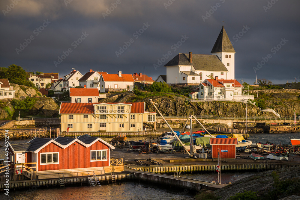 Sweden, Bohuslan, Tjorn Island, Skarhamn, town skyline with Skarhamn church, sunset (Editorial Use Only)