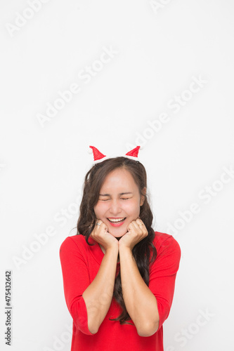 Cute Asian woman cheerful and scream on Christmas and New Year's Day.