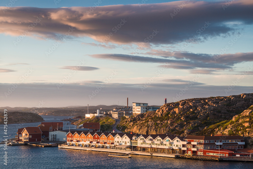 Obraz premium Sweden, Bohuslan, Kungshamn, high angle view of coastal houses and factory