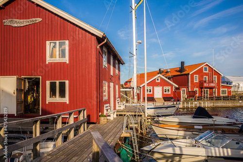 Sweden, Bohuslan, Smogen, Smogenbryggan, antique boat houses and fishing shacks photo
