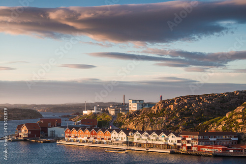 Sweden, Bohuslan, Kungshamn, high angle view of coastal houses and factory