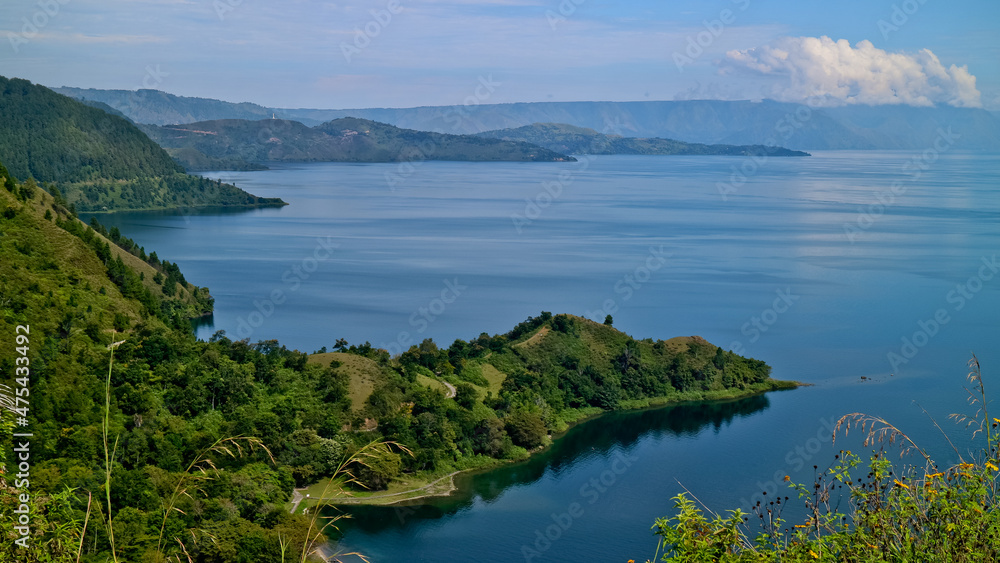 The beauty of Lake Toba which is a caldera lake comes from an ancient volcanic eruption and is the largest volcanic lake in the world. North Sumatra, Indonesia The beauty of Lake Toba which is a caldera lake comes from an ancient volcanic eruption and is the largest volcanic lake in the world. North Sumatra, Indonesia