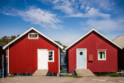 Sweden, Bohuslan, Hamburgsund, red fishing shacks