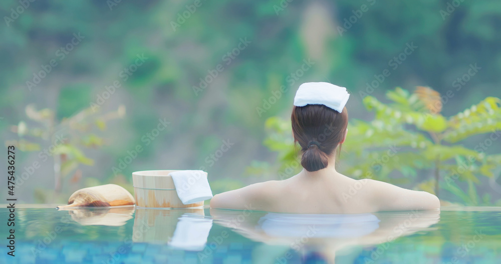 woman relax in hot spring - obrazy, fototapety, plakaty 