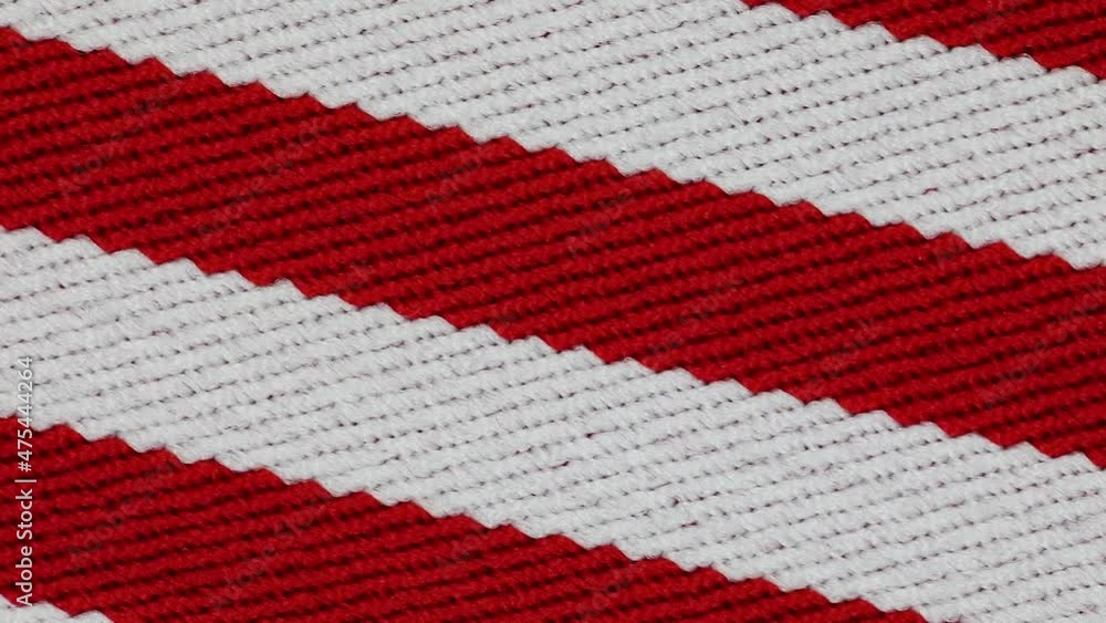 Knitted Textile With Red And White Horizontal Patterns. - Closeup Shot Knitted Textile With Red And White Horizontal Patterns. - Closeup Shot