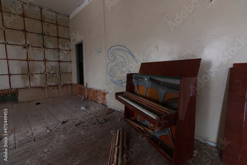 old piano in an abandoned building