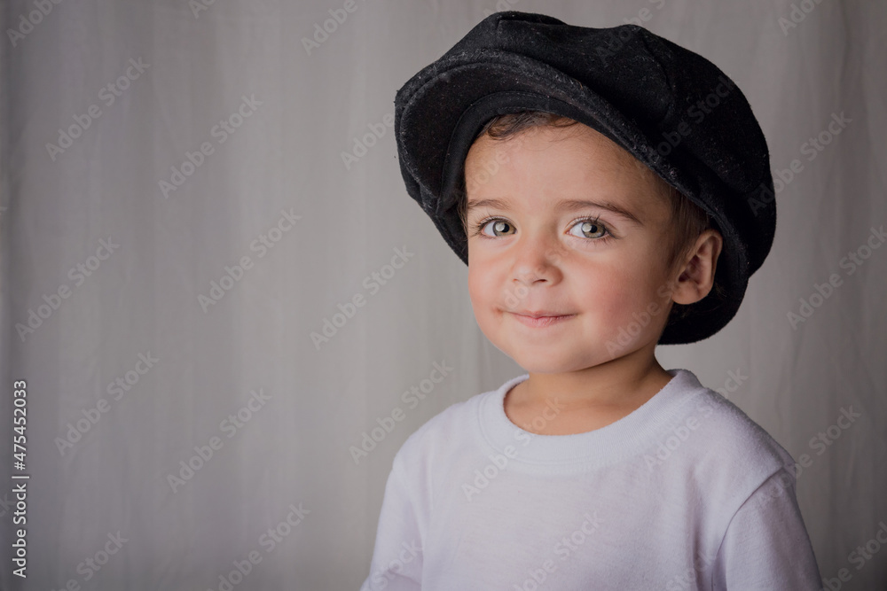 portrait of a little boy wearing an antique hat portrait of a little boy wearing an antique hat