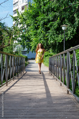 woman walking on the bridge