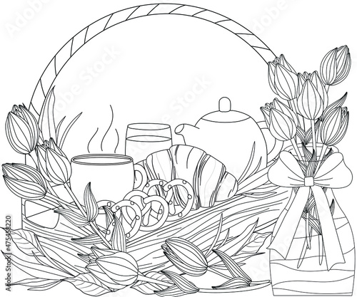 Breakfast basket, a tea cup with croissant and flowers