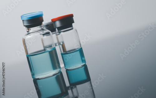 Vaccines against COVID-19. Therapeutic vaccine bottle for the mutated covid-19 coronavirus.
 photo