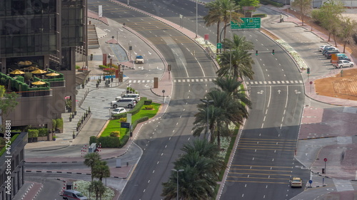 Skyline view of traffic on Al Saada street near DIFC district timelapse in Dubai, UAE.