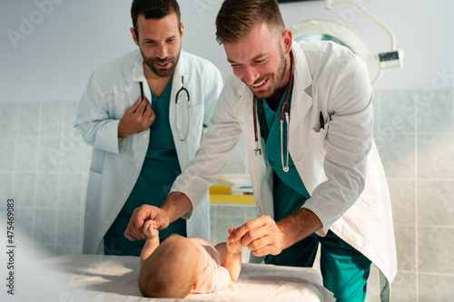 Pediatrician doctor examines baby. Healthcare  people  examination concept