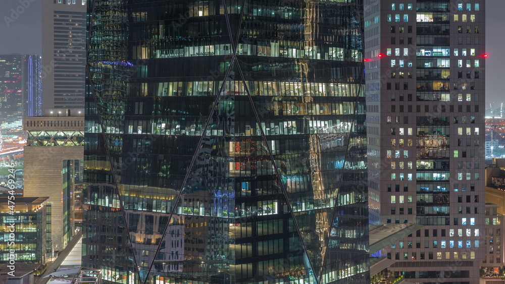 Windows of office buildings at night timelapse, the light from the windows of houses Windows of office buildings at night timelapse, the light from the windows of houses